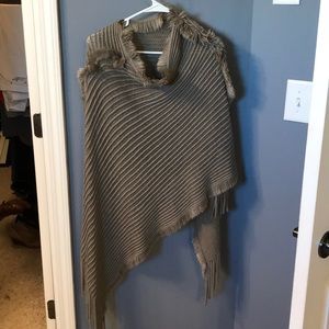 Knit poncho with fringe
